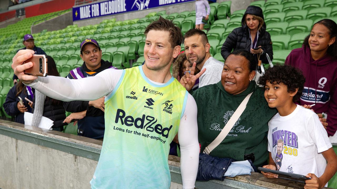 Harry Grant takes selfies with the Storm faithful. Picture: Mark Stewart