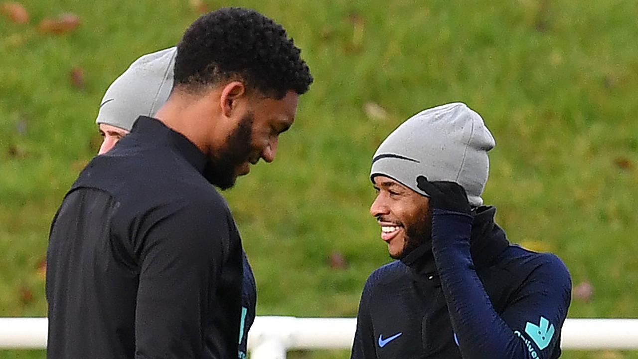 Joe Gomez and Raheem Sterling were all smiles in training after the incident.