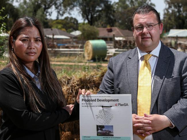 Sarah Ouk and Deputy Mayor Chad Buchanan at a site in Kings Road, Salisbury Downs on November 30, 2021. They have concerns with plans for a servo and 17 homes being built near her Kings Rd property.