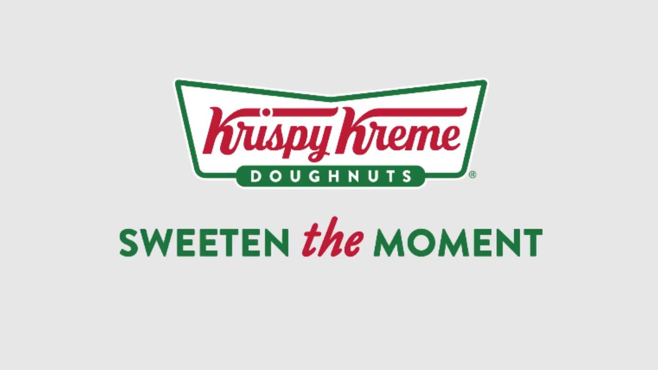 Krispy Kreme's new ad campaign is urging consumers to "sweeten the moment" by making their doughnuts a key feature of celebrations. Picture: Supplied