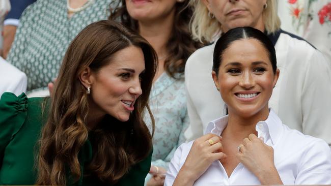 Smiling for the cameras at Wimbledon, 2019. Picture: AFP