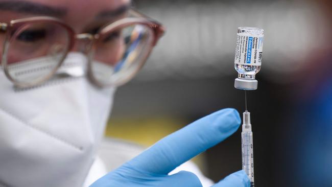 The landlord wants all tenants to have been vaccinated before signing their leases. Picture: Patrick T. Fallon/AFP