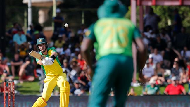 Pat Cummins (L) plays a shot during the second One Day International against South Africa earlier this month. Picture: AFP.