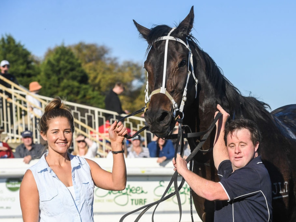 Trainer Michelle Payne with Steve Payne after their horse Rambler Rebel won the Hygain Winners Choice BM64 Handicap at Sportsbet-Ballarat Racecourse on April 24, 2022 in Ballarat, Australia. (Brett Holburt/Racing Photos via Getty Images)