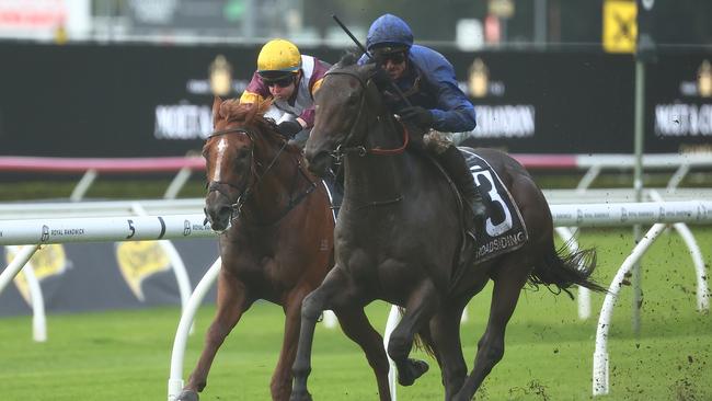 James Macdonald drives home Broadsiding in the mud to land the Group 1 Champagne Stakes at Royal Randwick in April Picture: Jeremy Ng/Getty Images