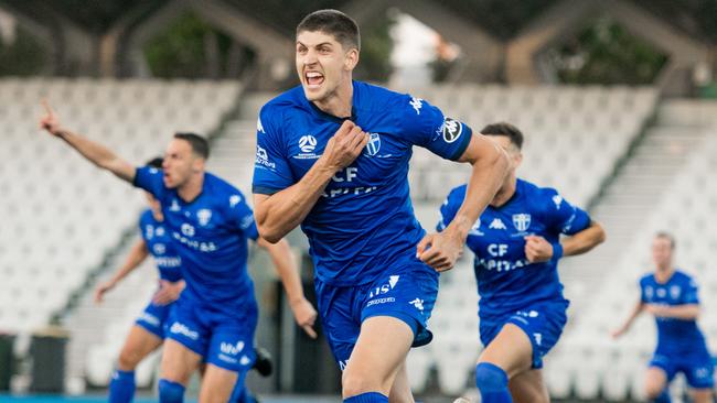 Harrison Sawyer celebrates a goal for South Melbourne. Picture: Luke Radziminski