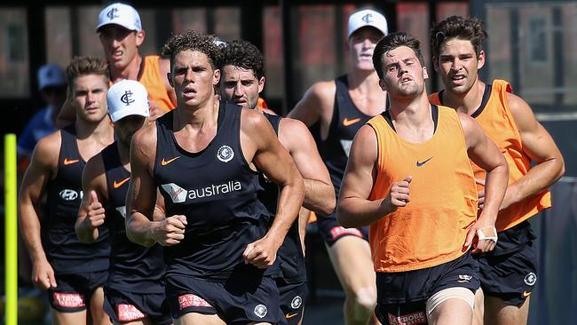 Nic Newman, front right, during a running sessions at Carlton training