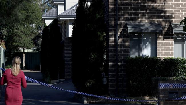 A crime scene is set up at the unit where the alleged murder took place in St Marys. Picture: Damian Shaw