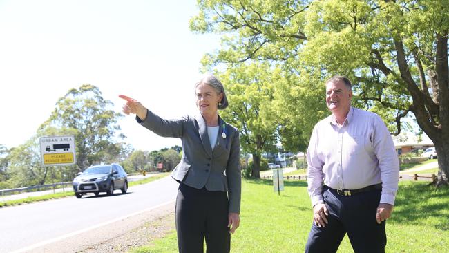 Megan O'Hara Sullivan and Mark Furner look at the New England Highway.