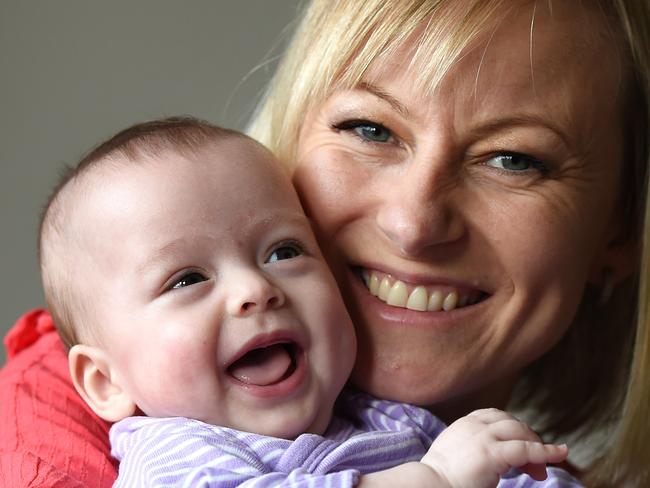 Pride of Australia Courage award nominee Michelle Buchholtz. Cancer mum Michelle Buchholtz was forced to deliver her baby girl early to prolong both her life and Ava's. Michelle Buchholtz with their daughter Ava. Picture: Jason Sammon