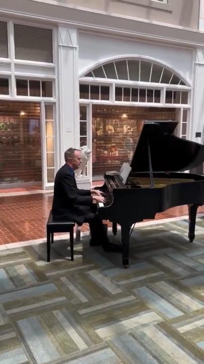 Airport evacuated for bomb threat as pianist stays behind to perform