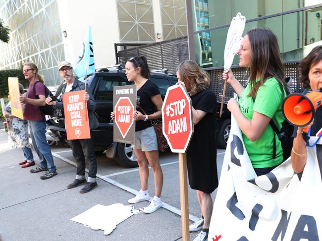 Anti Adani protesters are seen outside a hotel where Prime Minister Scott Morrison announces the government's climate package at a function in Melbourne. Monday, February 25. 2019. Picture: David Crosling(AAP Image/David Crosling) NO ARCHIVING,