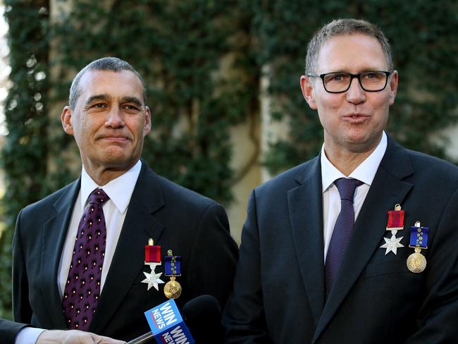 Craig Challen and Richard Harris after being awarded the Star of Courage and Medal of the Order of Australia (OAM) by The Governor-General, General Sir Peter Cosgrove. Picture: Kym Smith