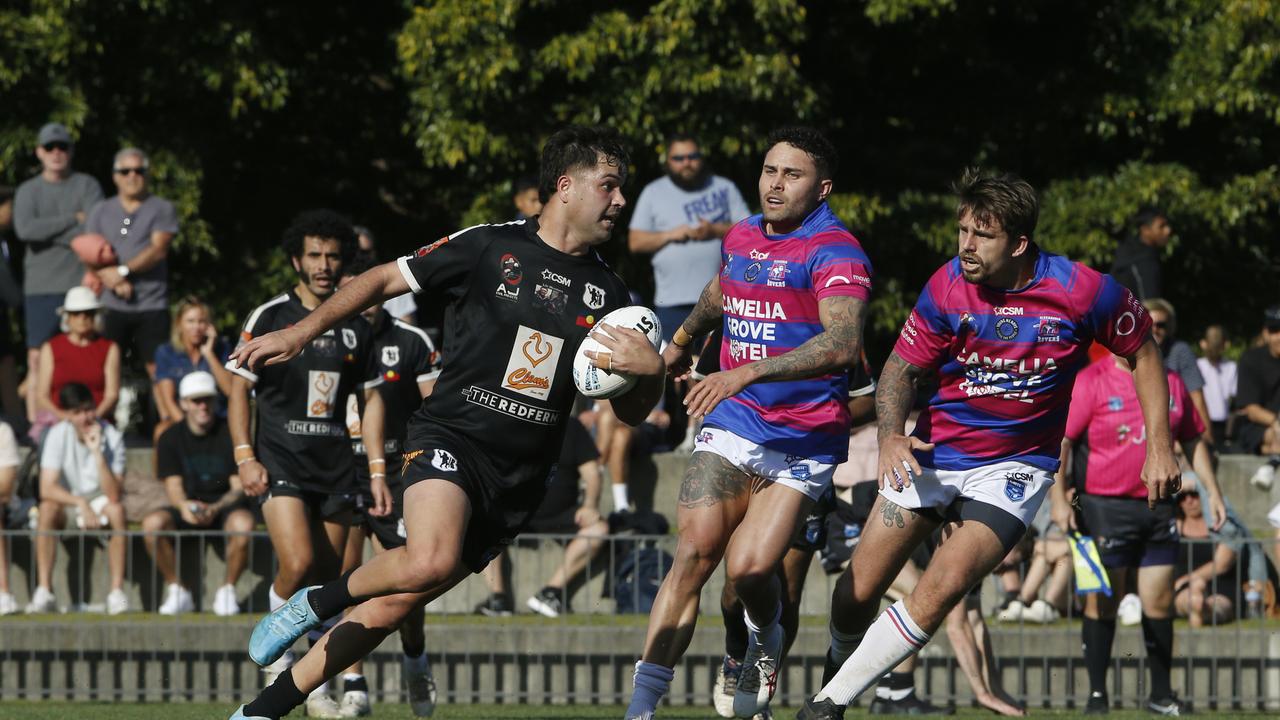 Redfern's Djawinj Gordon with the ball. Picture: John Appleyard