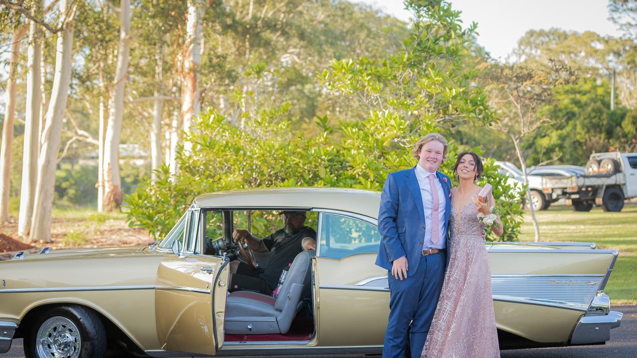 Glasshouse Christian College students Joshua Swanson and Cassidy Ferris arrive at their formal in a golden Chevrolet Bel Air. Picture: Jordan Bull