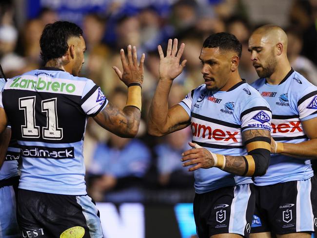 Sione Katoa of the Sharks celebrates scoring a try. (Photo by Jeremy Ng/Getty Images)