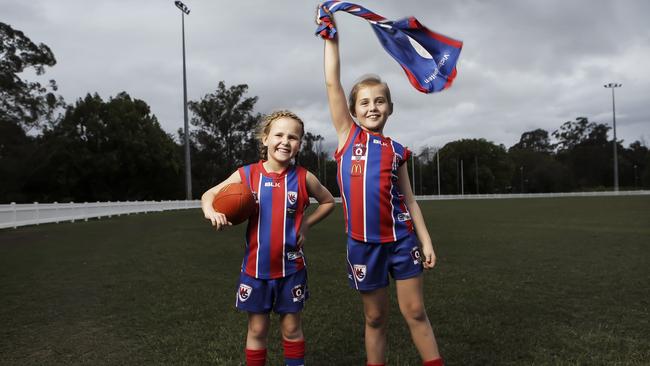 Mia Geere, right, aged 8. Little did she know she would be in the Lions academy years later. Photo Mark Cranitch.