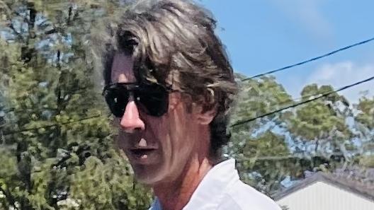 Daniel Lee Fraser leaves Coffs Harbour court charged with failing to comply with reporting obligations of being on the child protection register and allegedly possessing child abuse material.