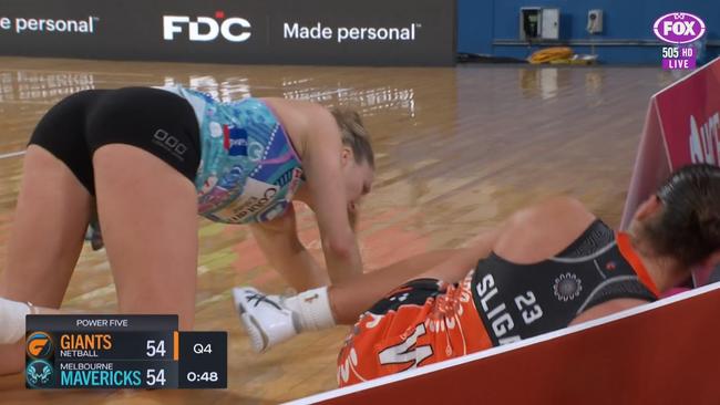 Both players were left sprawled on the court.