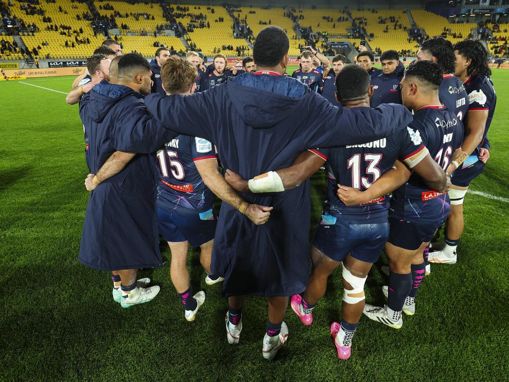 Rebels players form a huddle after their final game. Picture: Getty