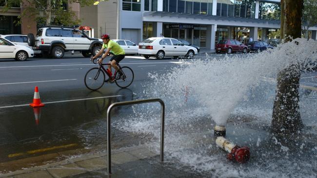 Burst water main in Pulteney Street between Flinders Street and Pirie Street, Adelaide.