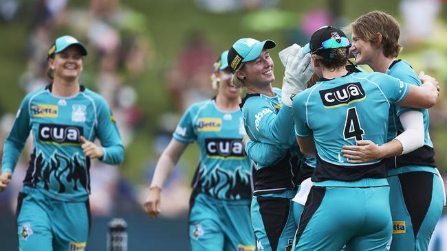 Johnson celebrates a wicket with her Brisbane Heat teammates. Picture: Getty Images