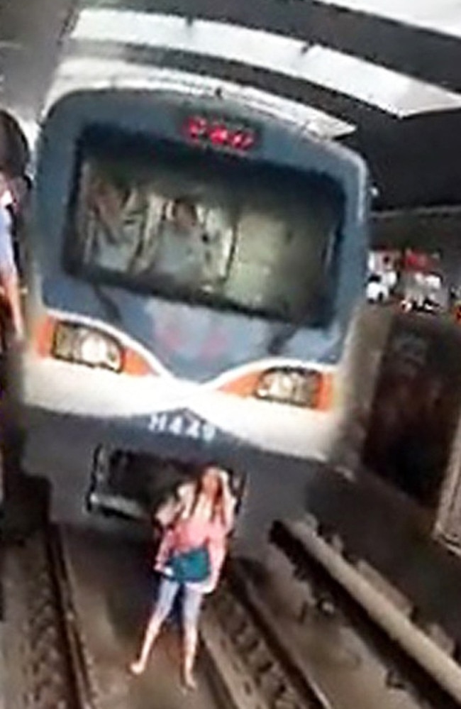 Yue Yan Mai gets run over by a train and survives.