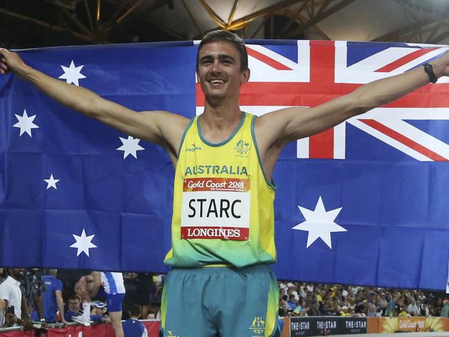 Australia's Brandon Starc celebrates his gold medal for the men's high jump final at Carrara Stadium during the Commonwealth Games on the Gold Coast, Australia, Wednesday, April 11, 2018. (AP Photo/Dita Alangkara)