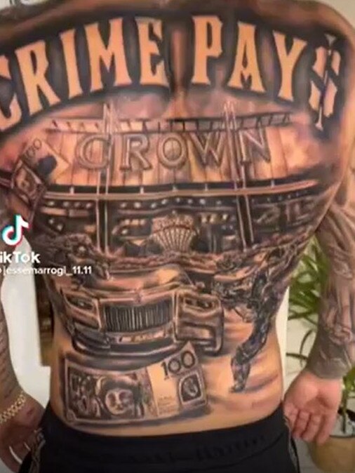 Jesse Marrogi’s tattoos include a police shootout among a fleet of Rolls Royces at the Crown.