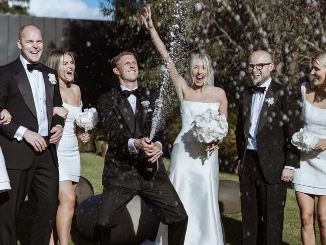 Lachie Whitfield and Adelle Beckwith celebrate with guests. Picture: Hey Jack