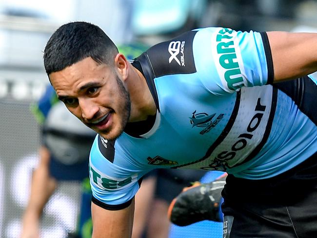 Valentine Holmes (left) of the Sharks scores a try against Aiden Tolman of the Bulldogs during the Round 25 NRL match between the Canterbury-Bankstown Bulldogs and the Cronulla-Sutherland Sharks at ANZ Stadium in Sydney, Sunday, September 2, 2018. (AAP Image/Brendan Esposito) NO ARCHIVING, EDITORIAL USE ONLY