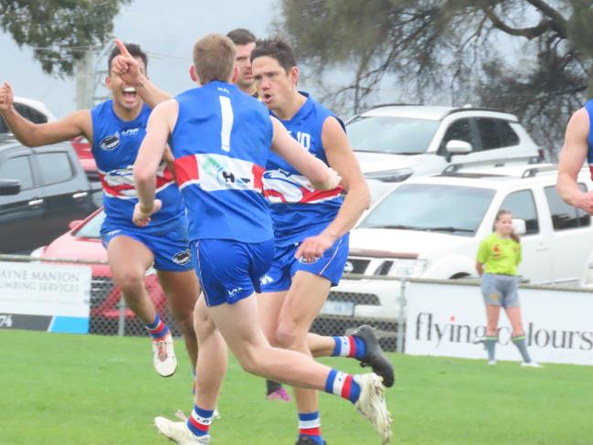 Leigh Harding celebrates kicking a goal with South Launceston teammates on Saturday. Picture: Jon Tuxworth