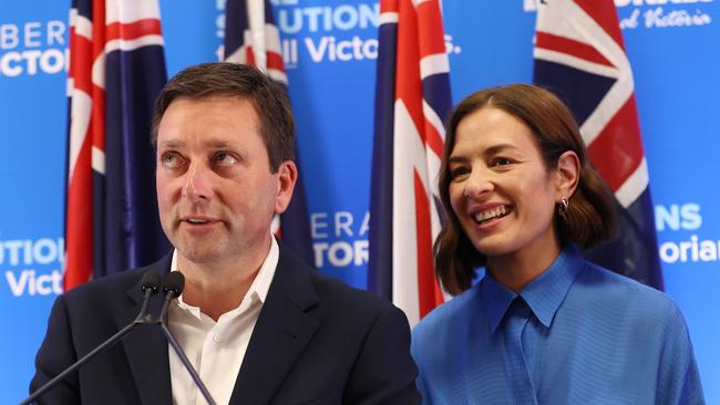 Matthew Guy, with wife Renae, addresses supporters after his electoral defeat to Daniel Andrews last Saturday. Picture: David Caird