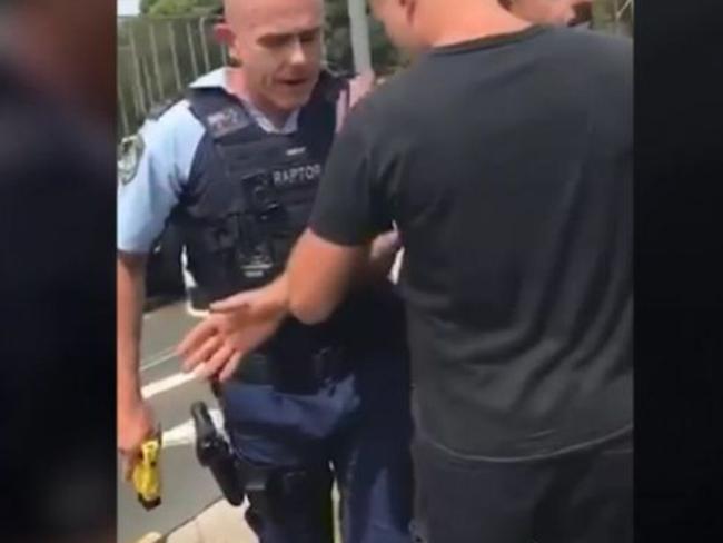The men get aggressive, telling Constable Murphy to ‘have some respect’. Picture: Supplied