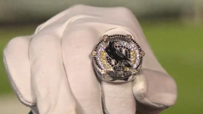 A prototype of Collingwood's 2023 premiership ring.