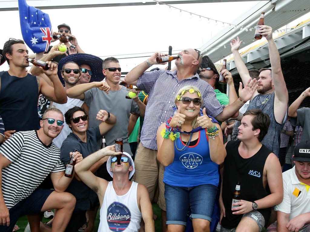 Merv Hughes having a beer with the crowd on the â€˜Triple M Australia One-Dayerâ€™ held on "the island" in Sydney Harbour. Picture: Jonathan Ng