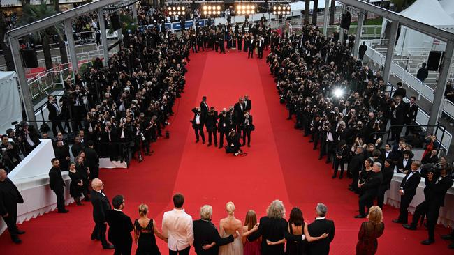 Casting and crews of the film "Furiosa: A Mad Max Saga" arrive for the screening of the film "Furiosa: A Mad Max Saga" at the 77th edition of the Cannes Film Festival in Cannes, southern France, on May 15, 2024. (Photo by Antonin THUILLIER / AFP)