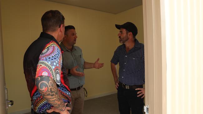 Attorney-General Chansey Paech speaking with Anindilyakwa Land Council and Drug and Alcohol Services Australia members during the site tour of the Anindilyakwa Healing Centre, Groote Eylandt on Friday February 2. Picture: Zizi Averill