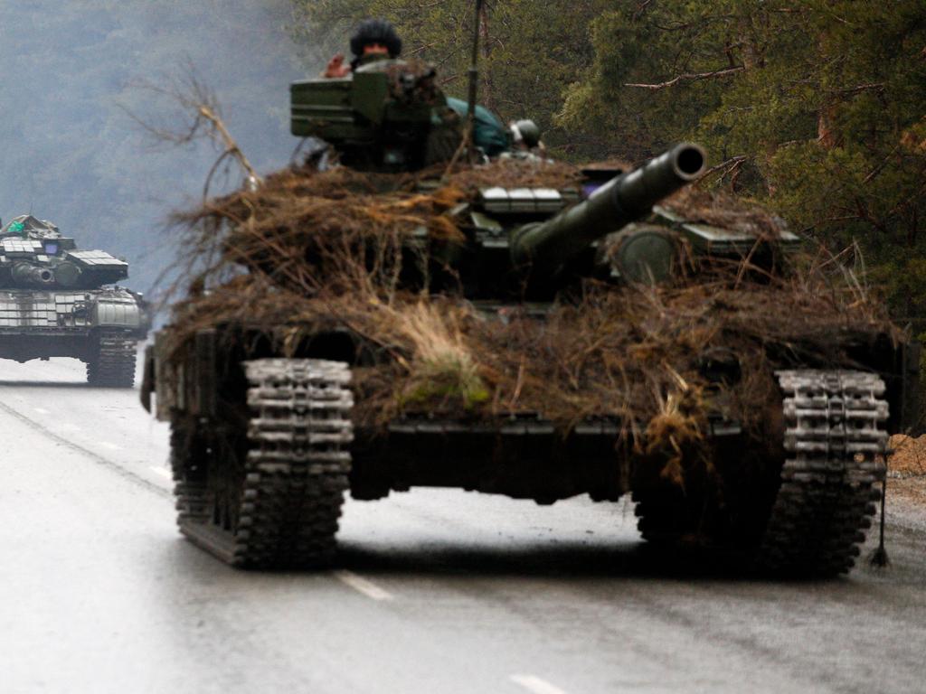 Ukrainian tanks move on a road before an attack in Lugansk region. Picture: AFP