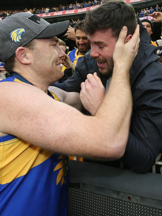 West Coast's Jeremy McGovern hugs brother Mitch after the grand final. Pic: Michael Klein