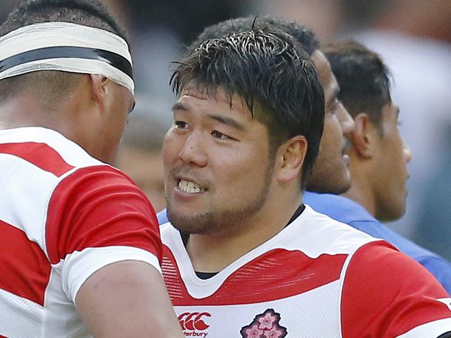 Rugby Union - Samoa v Japan - IRB Rugby World Cup 2015 Pool B - Stadium MK, Milton Keynes, England - 3/10/15 Japan's Hendrik Tui and Masataka Mikami celebrate after the game Action Images via Reuters / Andrew Boyers Livepic