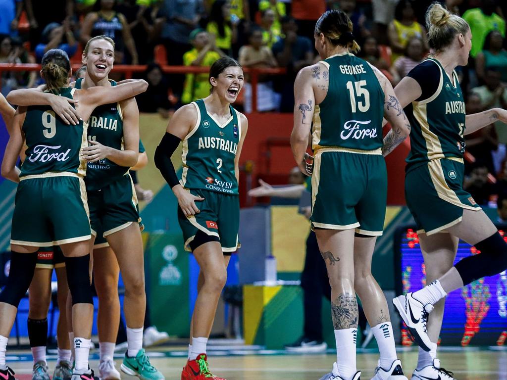 Australian players celebrate their victory. Picture: THIAGO GOMES / AFP)