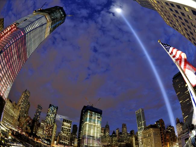 The Ground Zero Memorial and the Light Beam are seen in Manhattan in 2011.