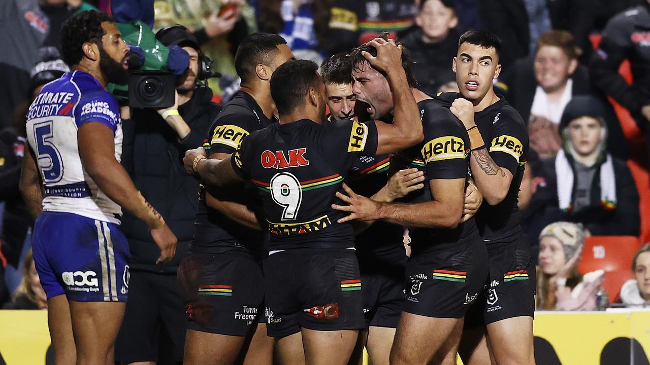 PENRITH, AUSTRALIA - JUNE 03: Jaeman Salmon of the Panthers celebrates with team mates after scoring a try during the round 13 NRL match between the Penrith Panthers and the Canterbury Bulldogs at BlueBet Stadium on June 03, 2022, in Penrith, Australia. (Photo by Matt King/Getty Images)