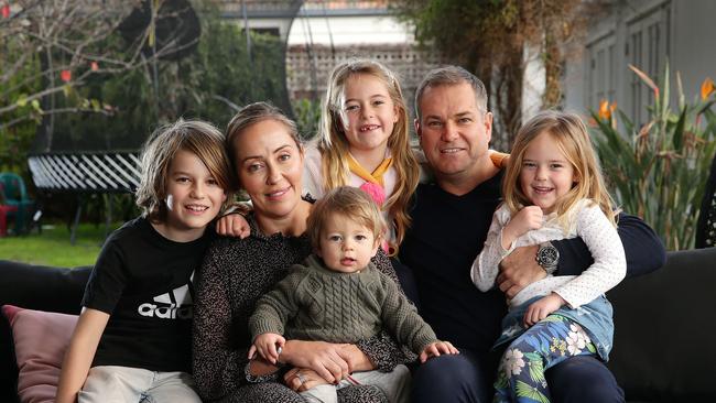 Brighton's Considine family. Mum Carnie saw a warning from Jazze Jervis as she was in the process of hiring 'Harper'. Carnie and Glenn with kids Beau, Jude, Poppy and Summer. Picture: Andrew Tauber