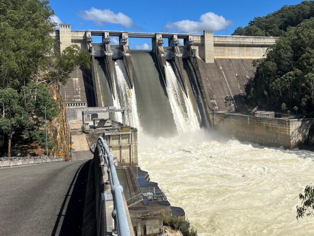 WARRANGAMBA, AUSTRALIA. APRIL 6, 2024 Warragamba Dam spill gates opened. , Following heavy rainfall overnight at the upper end of the forecasts (the 25% chance), Warragamba Dam reached full capacity and started spilling at 5:45am., The Warragamba catchment received a significant amount of rain from midnight at an average of 100 mm over 6 hours, with the sub-catchment, close to the dam wall, receiving ~130mm. Up to 200mm was received over 24 hours in some areas., This created flash flooding in the catchment and into the dam, causing it to spill., Warragamba Dam is spilling at a rate of around 200 gigalitres per day (GL/day) with that rate continuing to rise., With the flooding in the Hawkesbury-Nepean Valley the spill will contribute to the flood waters already in the system. Picture: Via NCA NewsWire.