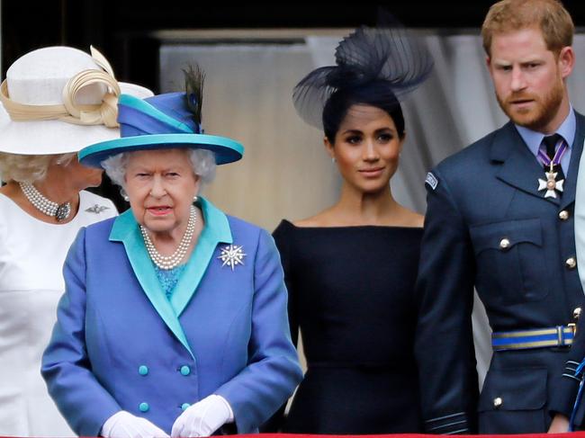 The Queen, second from left, with Meghan and Harry in 2018. Picture: AFP