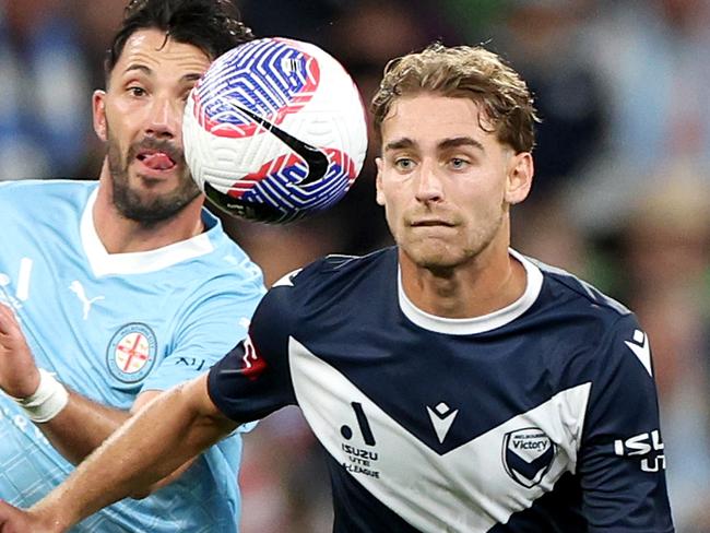 MELBOURNE, AUSTRALIA - MAY 05: Ryan Teague of Melbourne Victory and Tolgay Arslan of Melbourne City contest for the ball during the A-League Men Elimination Final match between Melbourne Victory and Melbourne City at AAMI Park, on May 05, 2024, in Melbourne, Australia. (Photo by Jonathan DiMaggio/Getty Images)