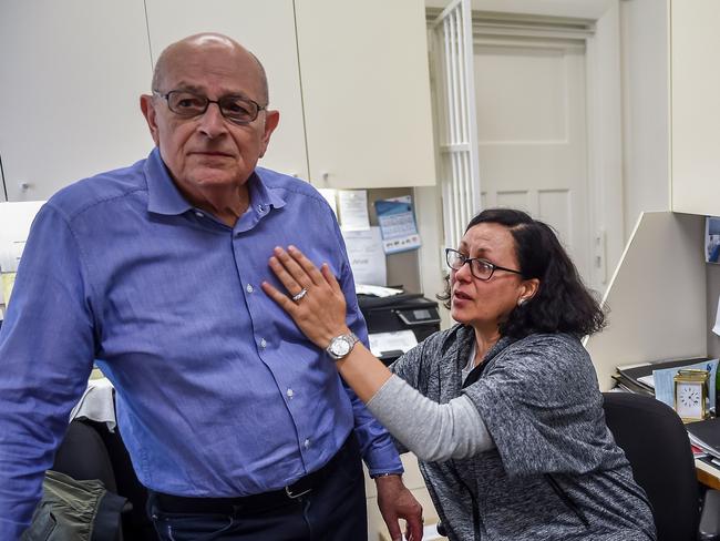 IMP Jewellery owner Tony Fialides and his wife watch the security footage for the first time. Picture: Jake Nowakowski