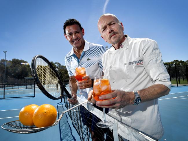 Tennis identity Roger Rasheed with celebrity chef Simon Bryant are serving up something special for the Adelaide International tennis event. Photo: AAP Image/Sam Wundke